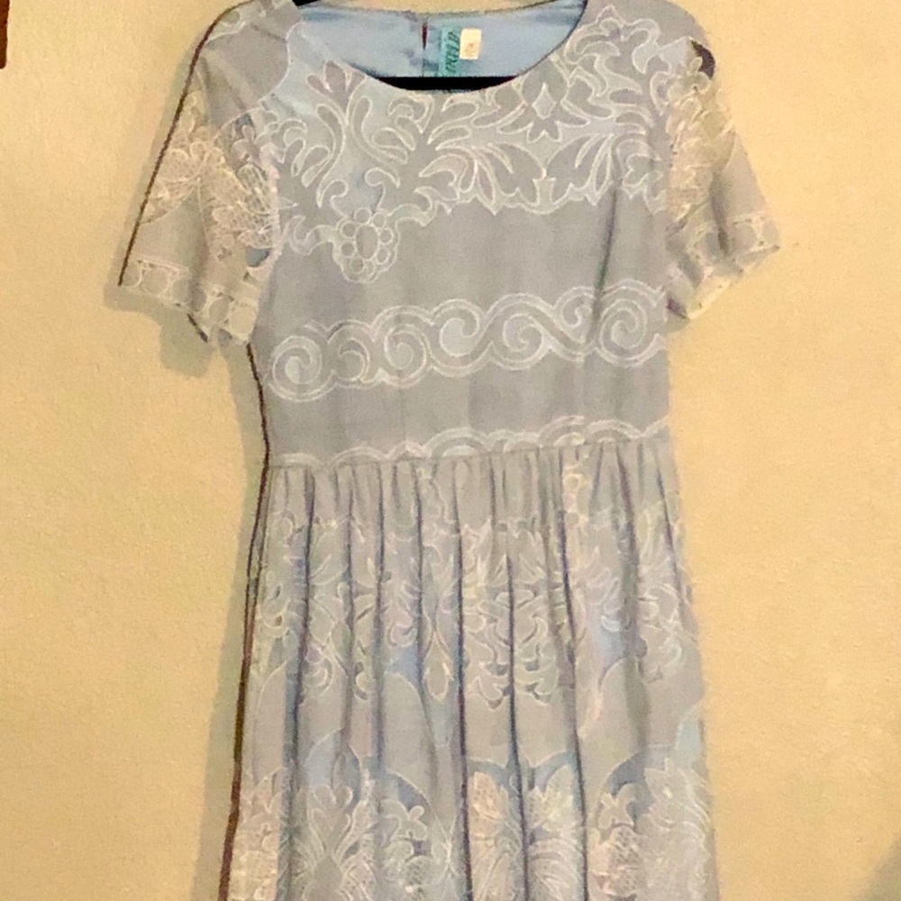 Just above the knee blue and white dress